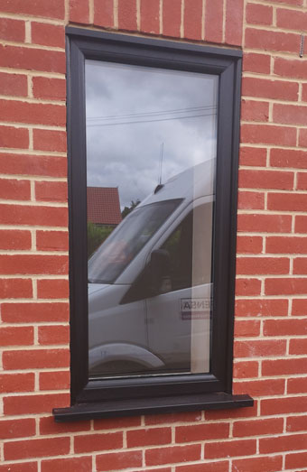 Black foiled upvc window fitted in Norfolk
