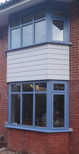 blue aluminium windows fitted in Norfolk